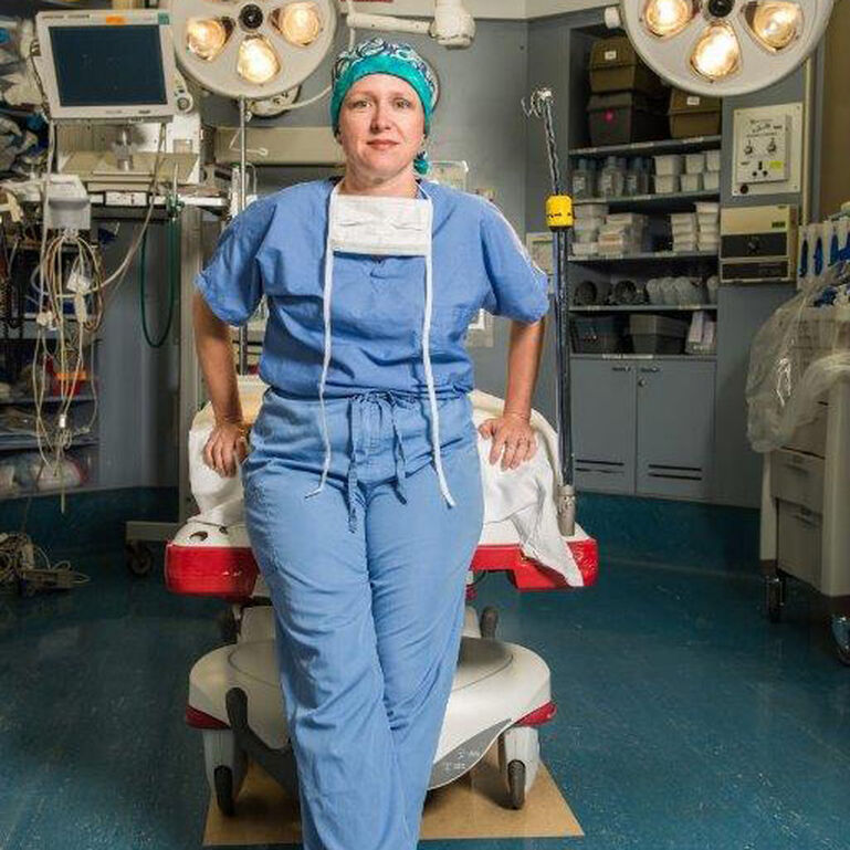 Physician in emergency room suite